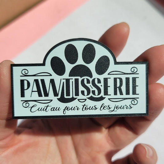 pawtisserie cat bakery sign with pawprint