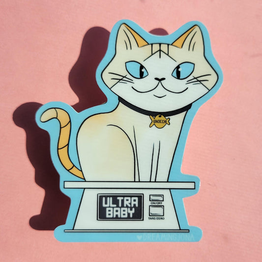 Cartoon cat on a scale with 'Ultra Baby' branding on a pink background