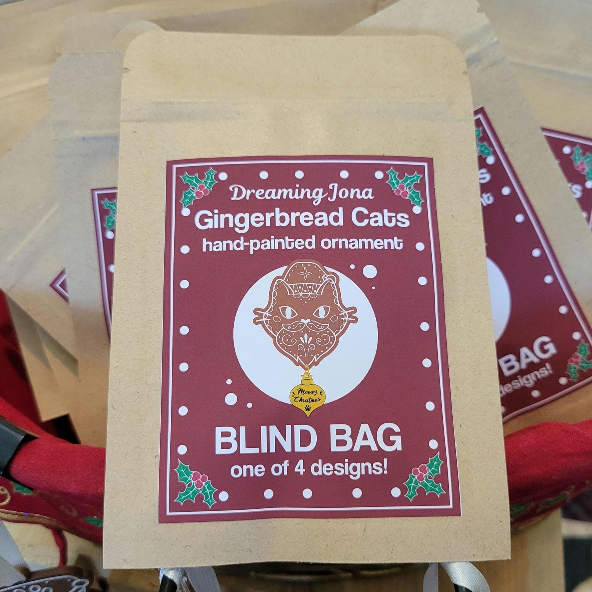 Blind bag packaging for 'Dreaming Jona Gingerbread Cats' hand-painted ornaments