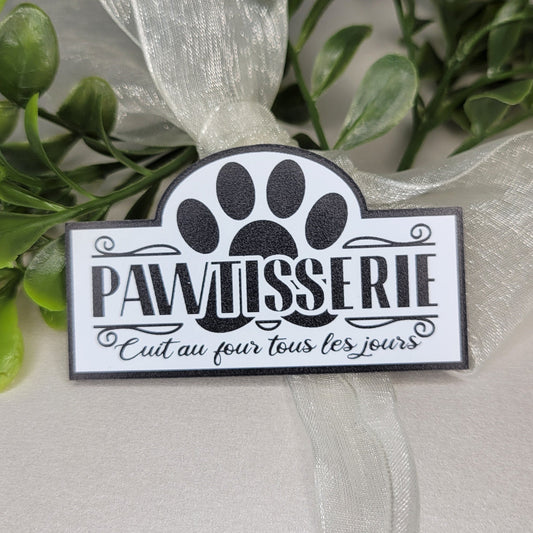 Decorative french sign with paw print and text 