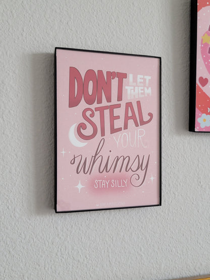 Pink framed quote on a textured white wall
